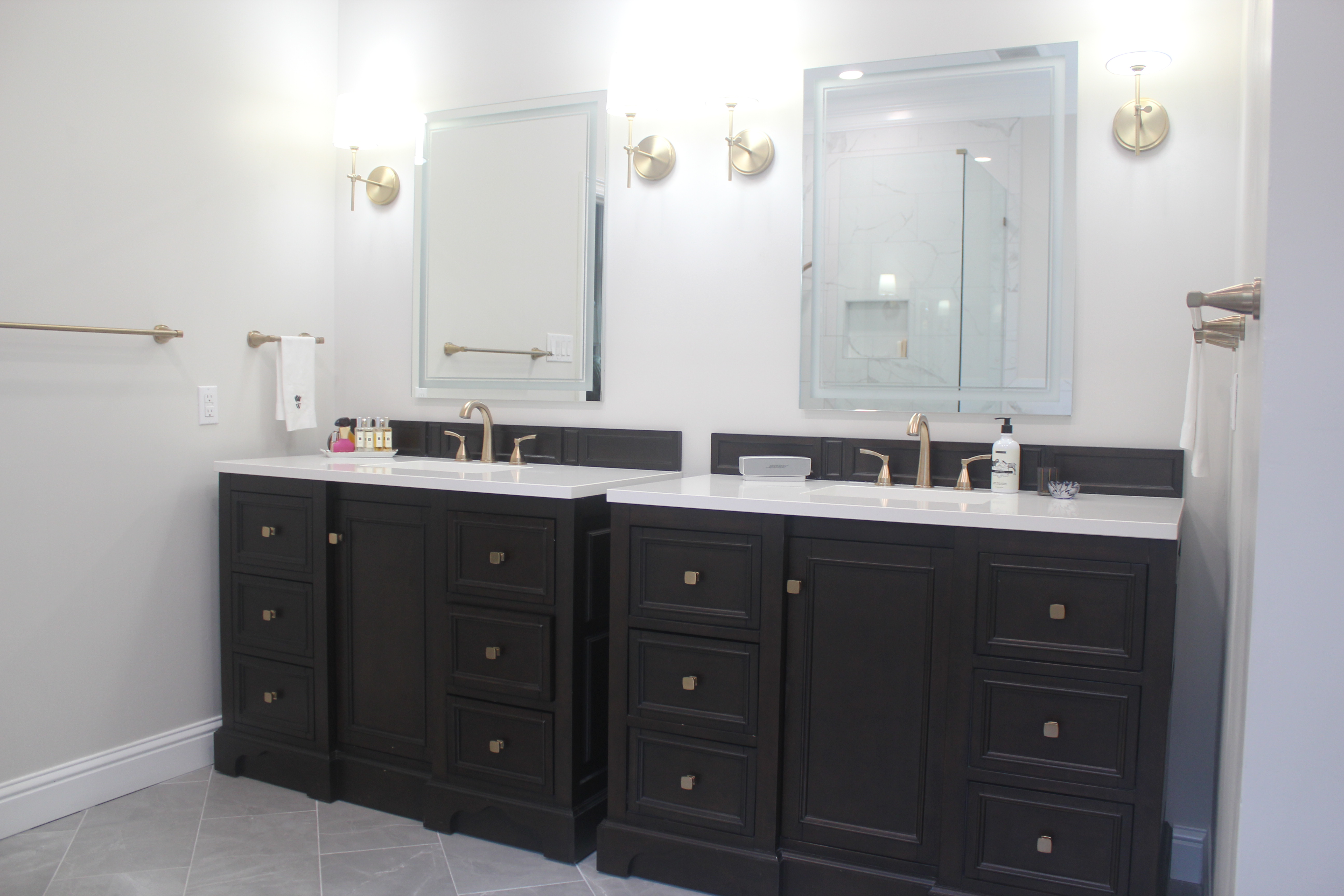 Ocean Springs, MS master bathroom remodel with two 48" freestanding vanities