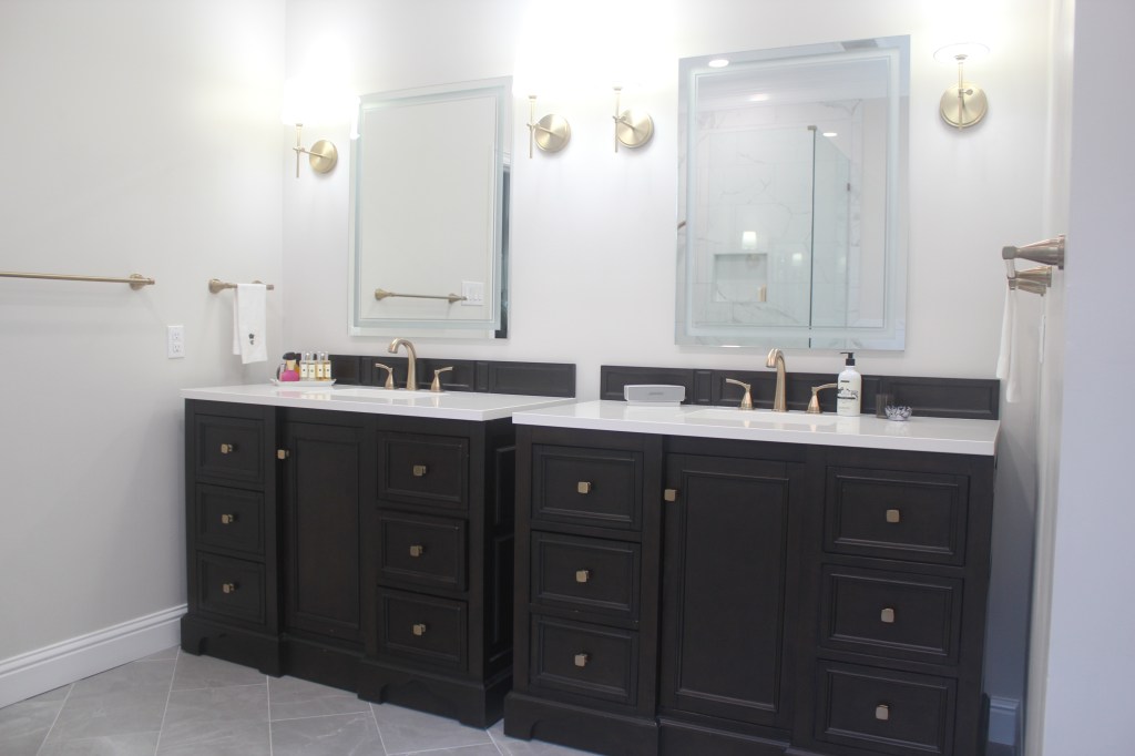 two separate 48" bathroom vanities